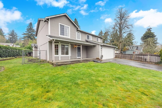 Photo - 5 Bedrooms ( one brm is on main floor) and 4 bathrooms (2 are on main floor), Fenced Back Yard, A...