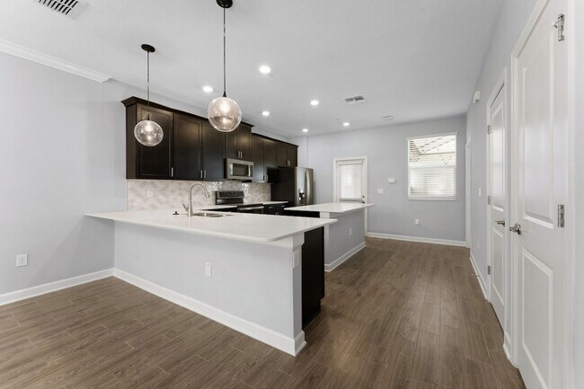 Photo - Immaculate 3/2.5 Townhome w/2-Car Garage in Storey Park of Lake Nona