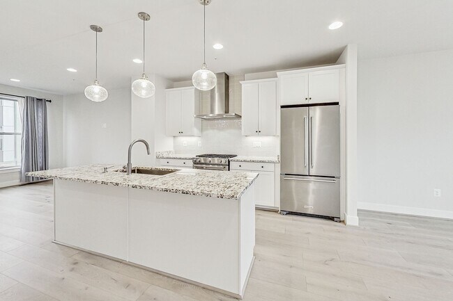 Photo - Contemporary 4 bedroom, 3.5 bath Open Concept Townhome!