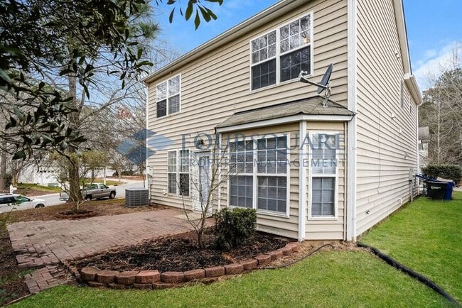 Photo - Spacious 3-Bed Single-Family Home with Fireplace, Back Patio & 2-Car Garage – Near RTP, I-40 & So...