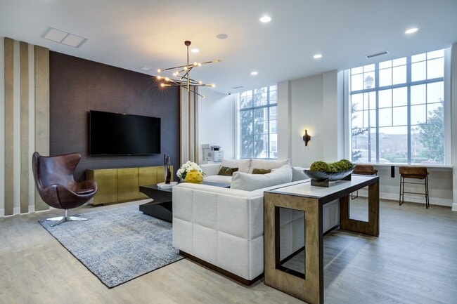 View-At-Legacy Oaks-Apartment-Homes-in-Knightdale-NC-Renovated-Clubhouse-Lounge-Area-TV