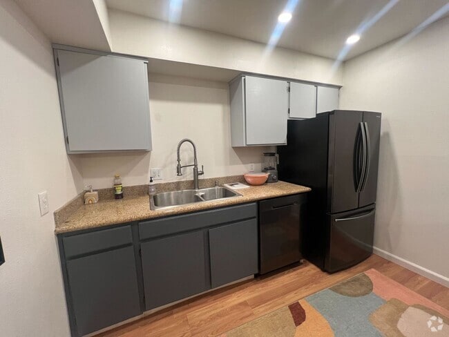 Building Photo - Charming Furnished 1-Bedroom Loft-Style Co...