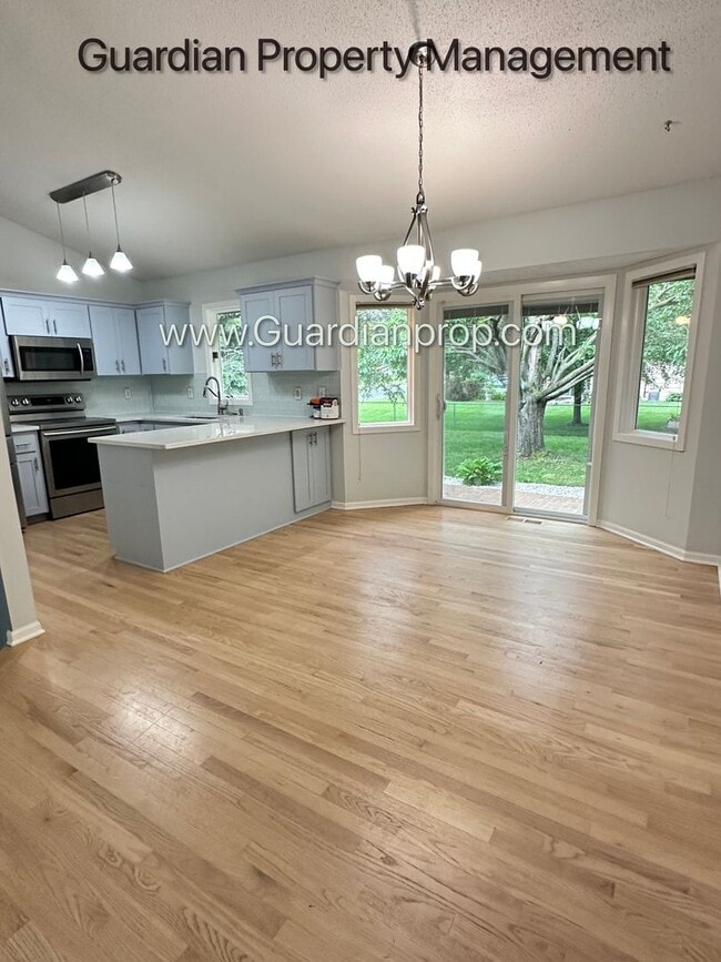 Building Photo - Maple Grove Split Level Home, Fenced Yard, 2 Car Garage, Dishwasher, W/D