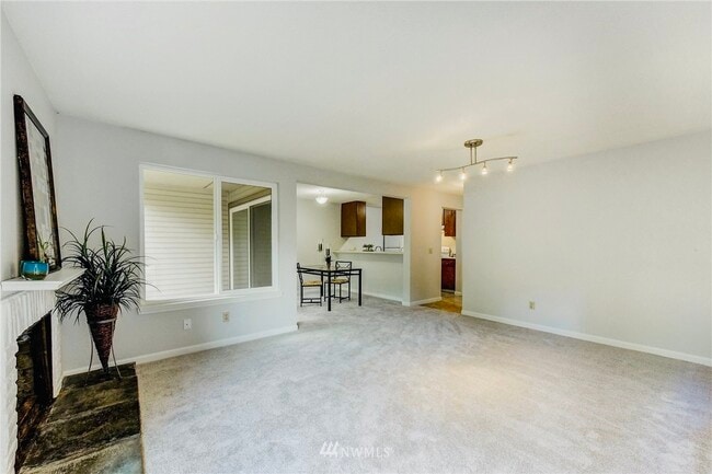 Building Photo - 4426 147th Plz NE Unit A10