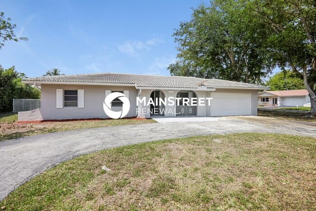 Building Photo - 4 Bedroom Pet-Friendly Home in Coral Springs, FL with Main Street Renewal