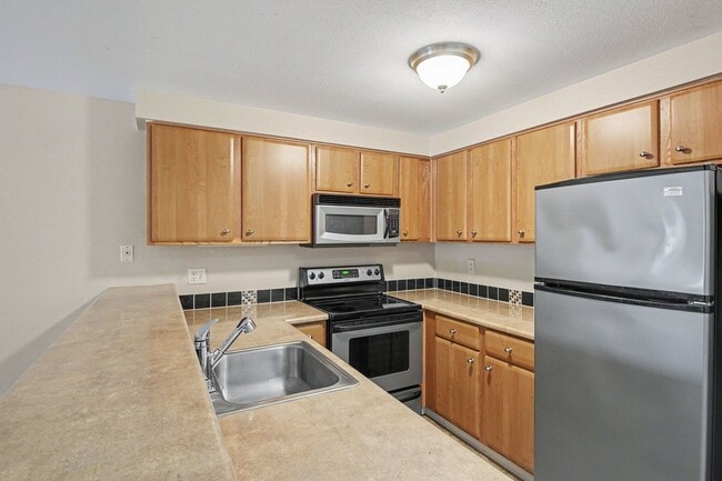 Building Photo - Charming Ground-Floor Condo in the Heart of Greenwood! $1,900 only!! August move in!
