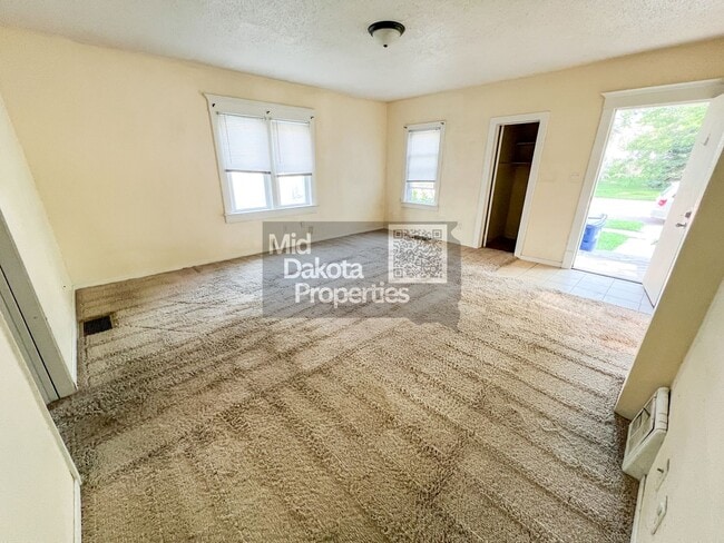 Photo - 605 W 10th-4 Bedroom House with Garage