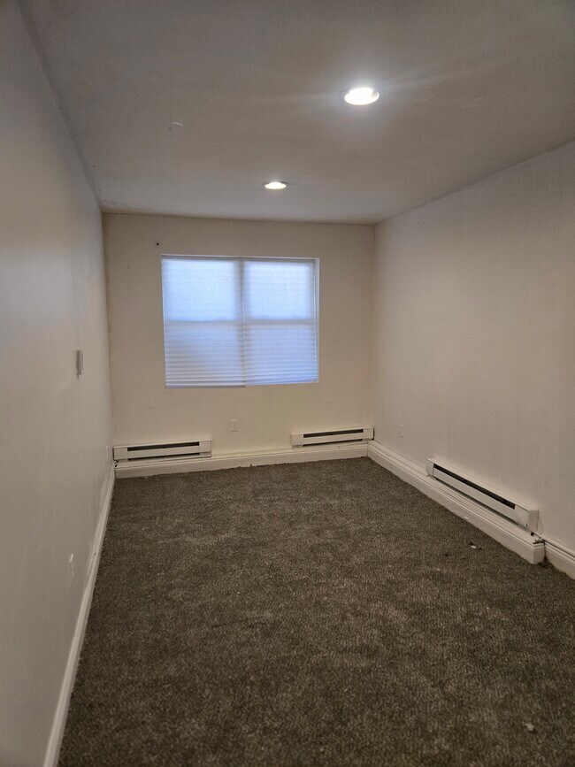 Photo - 945 E 220th St Unit 1