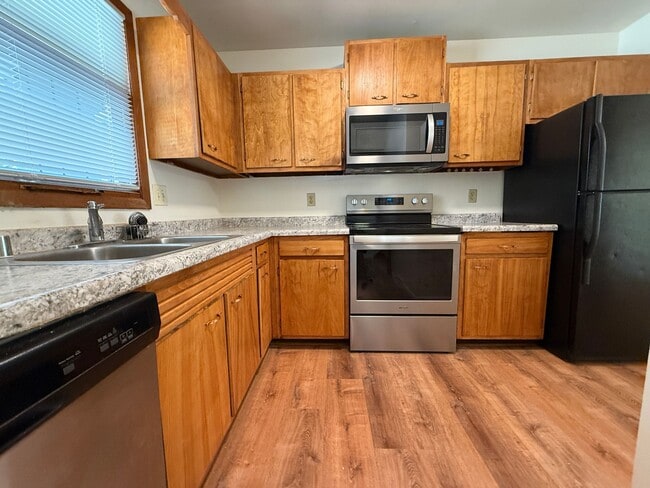 Photo - August 15th rent special! New deck! 3 Bedroom, updated kitchen, updated flooring, garage, drivewa...