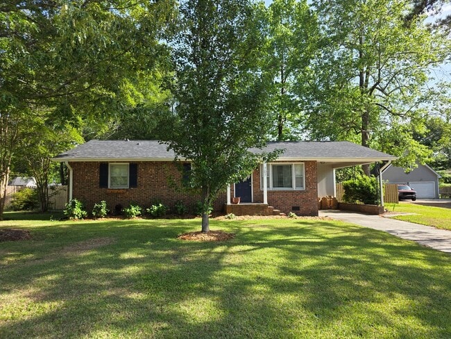 Photo - Sherwood Forest Gem | Spacious 3BR Home with Fenced Yard & Flex Room