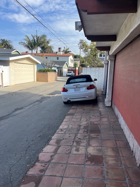 dedicated parking pad - 605 35th St Unit MB GuestHouse