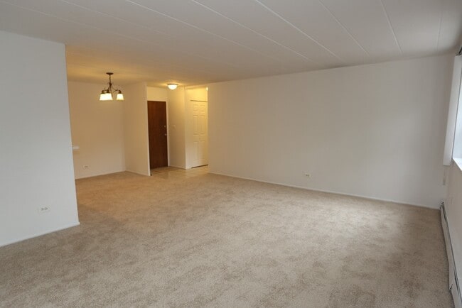 Building Photo - 2349 W Jarvis Ave Unit 55-1L Rental