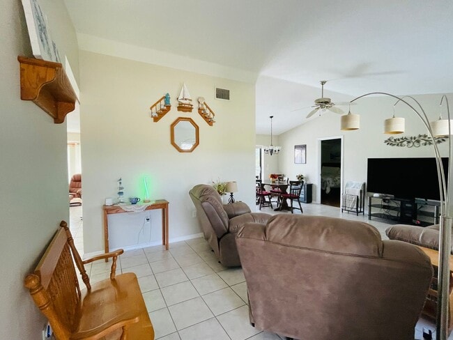 Photo - SOUTH GULF COVE-WATERFRONT POOL HOME!