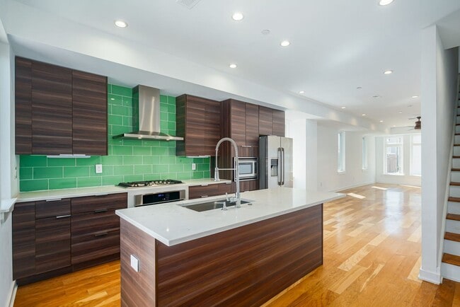 Building Photo - Stunning 4-Bedroom Townhouse with Garage and Rooftop Deck! Available late May!