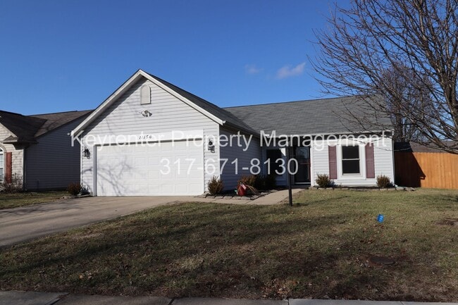 Building Photo - Discover this well-maintained 3-bedroom, 2-bath home in Indianapolis featuring an attached garage...