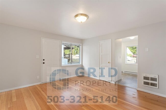 Photo - Charming 2BR House with Garage & Private Patio in Vancouver!