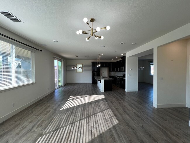 Photo - Beautiful 4 Bedroom Solar Home With Low Maintenance Landscaping And Updated Interior