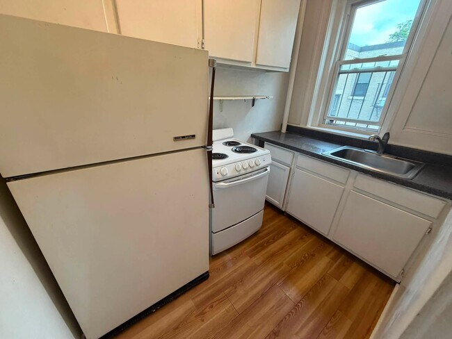 Building Photo - 313 Allston St Unit 12