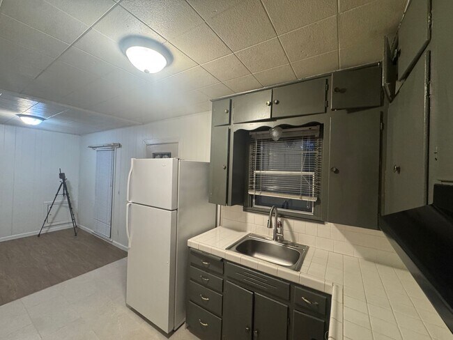 Photo - CUTE!!! 2 Bedroom 1 Bath Cute Home with Beautiful Landscaping and Garage