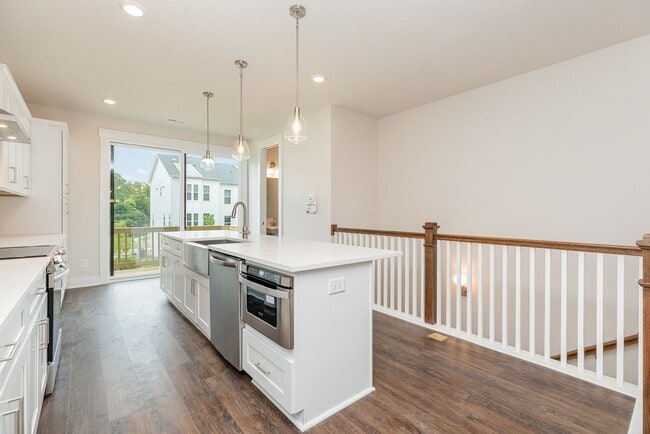 Photo - Beautiful 3BR 2.5BA Townhome w/ Full Appliance Kitchen • Garage Parking • Ultra-Modern