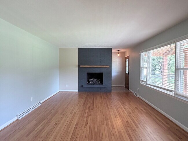 Photo - Updated 3BR Home in Beaver Lake | Fenced Yard, Garage, Covered Porch & Outdoor Fireplace | Pet Fr...