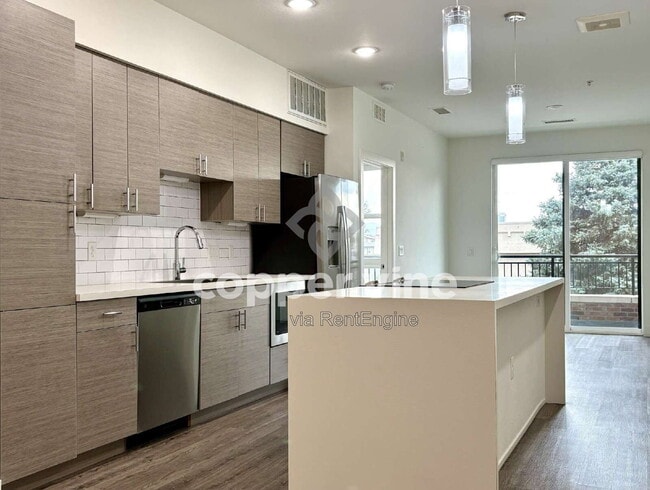 Building Photo - 3500 S Corona St Unit 202