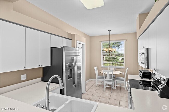 Building Photo - 3800 Sawgrass Way Unit 3125 Rental