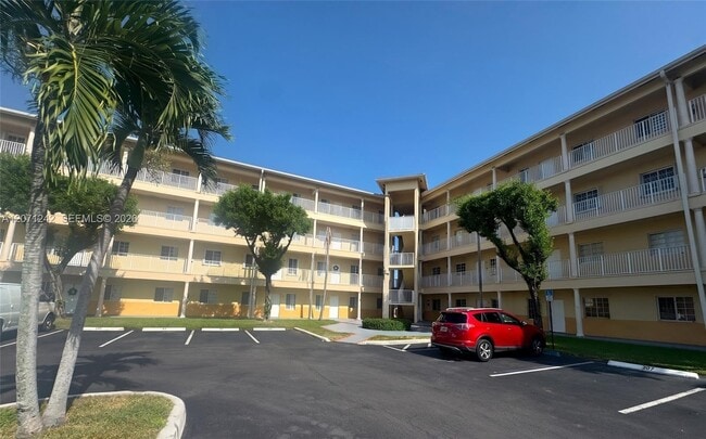 Building Photo - 6940 NW 179th St Unit 404-7