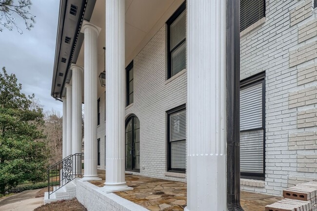 Photo - Furnished Estate Home - Double Curved Stairway - Marble Floors - Waterfall Island