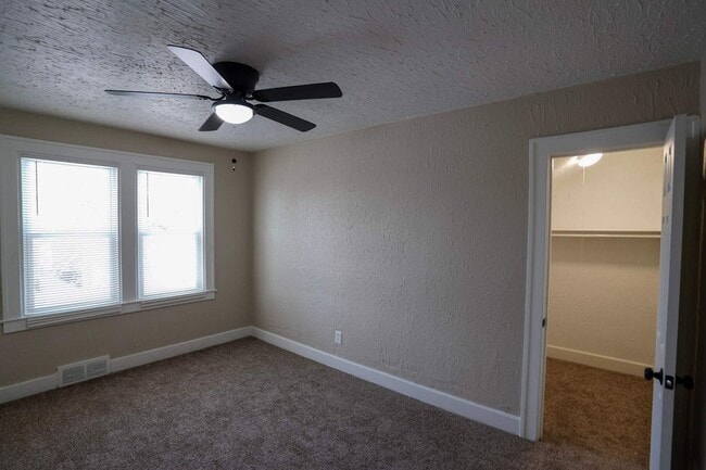 Photo - This beautifully updated 5-bedroom, 1-bath single-family home is ready for move-in!