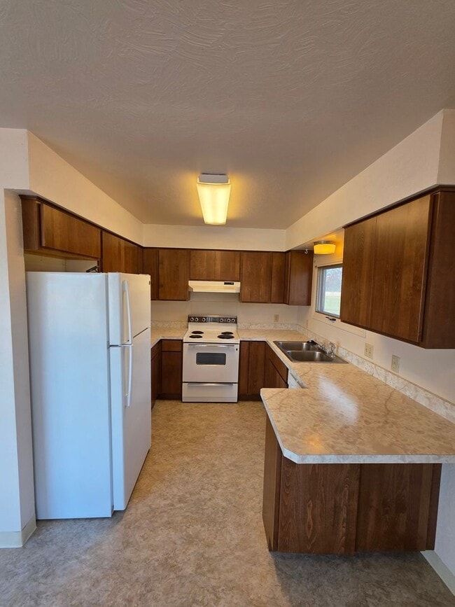 Photo - Single level duplex with attached single-c...