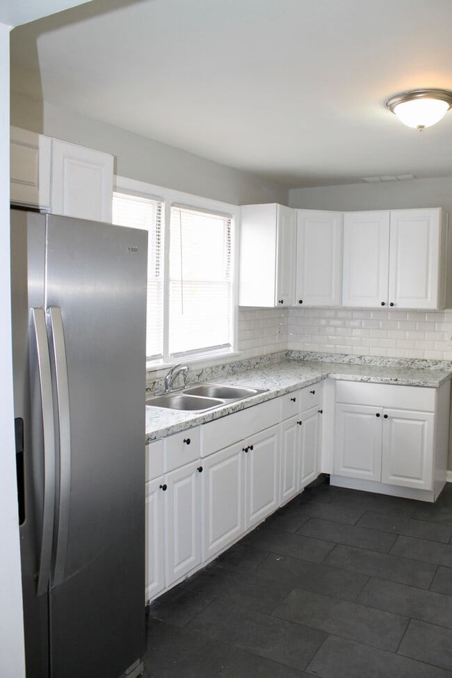 Photo - Luxurious Newly Renovated 3BR/2BA Haven with Private Parking - A Rare Market Gem
