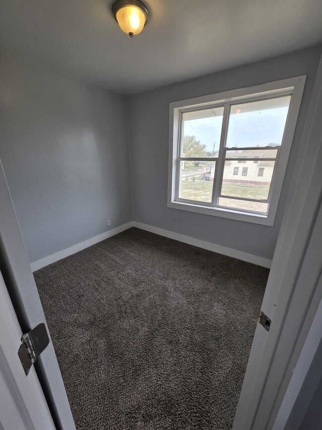 Middle Bedroom - 7061 Elmhurst St Unit FL 2