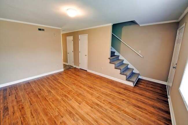 Building Photo - Courtyard Townhomes Unit Savana 2 Bedroom