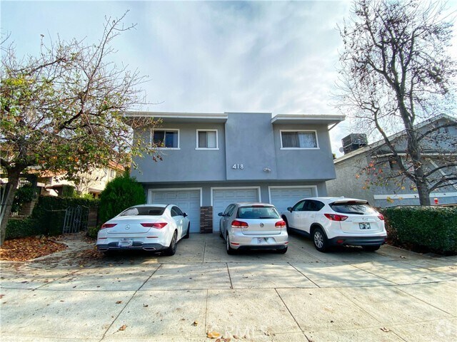 Building Photo - 418 E Harvard Rd Unit F Rental