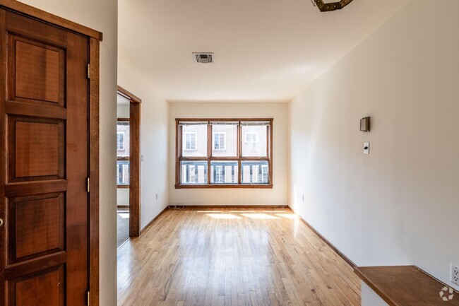 Building Photo - 207-211 W Water St Unit Apt. 208