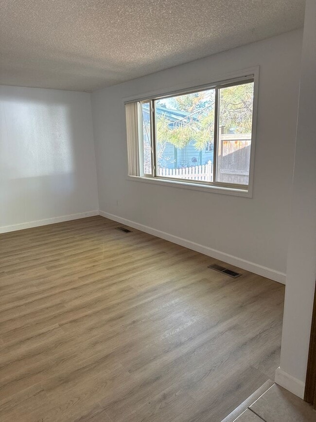 Photo - SE Home on Large Lot, New Luxury Vinyl Flooring & Paint, RV parking, Air Conditioning & Fenced