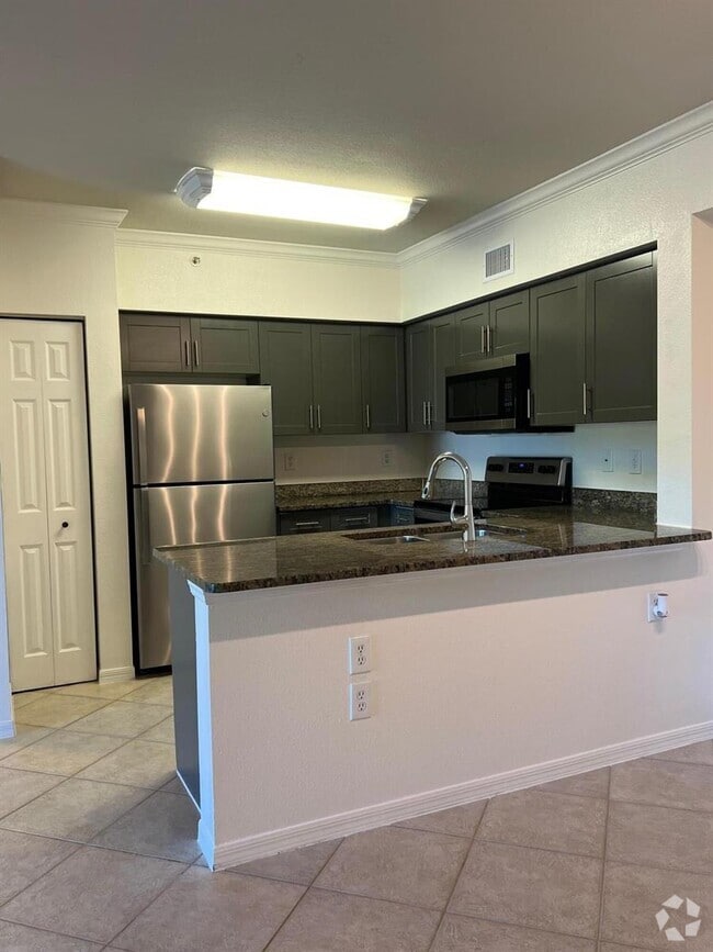Building Photo - 6434 Emerald Dunes Dr Unit 302 Rental