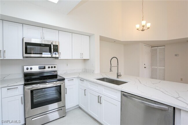 Building Photo - 1265 Wildwood Lakes Blvd Unit 3-306