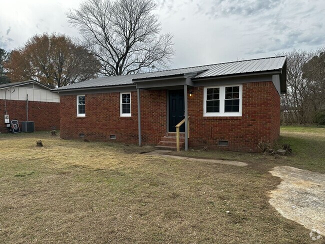 Building Photo - Cozy 3 Bedroom Rental