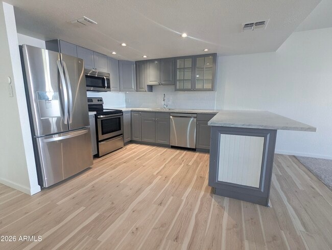 Building Photo - 7910 E Camelback Rd Unit 211