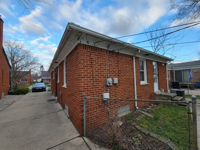 Back and side of house - 11457 Leverne