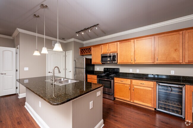 2BR, 2BA - 1,055SF - Kitchen - 82 Flats At The Crossing
