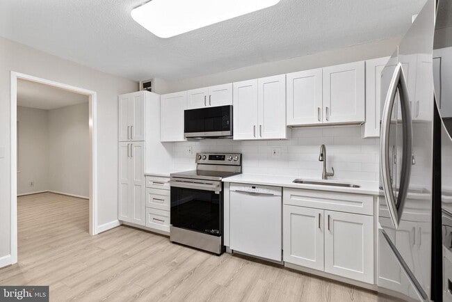 Photo - 8340 Greensboro Dr Unit 207