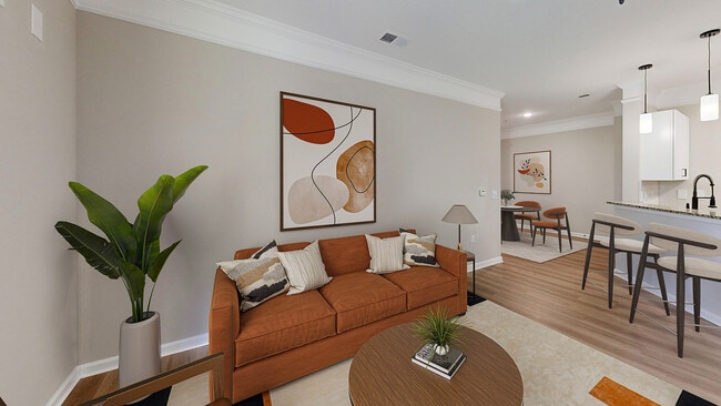 Sala de estar recientemente renovada - Waterstone at Brier Creek Apartments