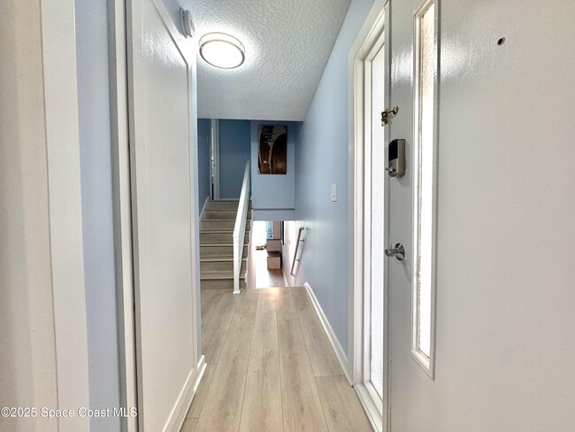 Building Photo - 5050 Ocean Beach Blvd Unit 301