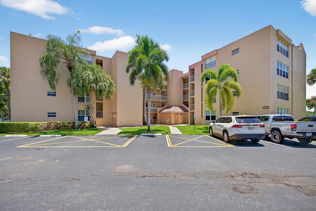 Building Photo - 9480 Tangerine Pl Unit 202 Rental