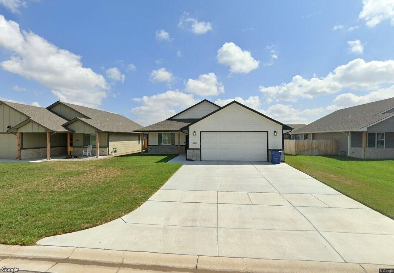 Photo - Single Family Home with three bedrooms two bathrooms and two car garage. Zero entry slab home. Mo...