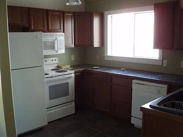 Building Photo - 2413 Leon St Unit #201