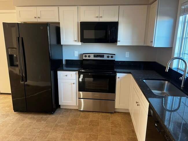Photo - New carpet, kitchen, appliances, paint! Great neighborhood.